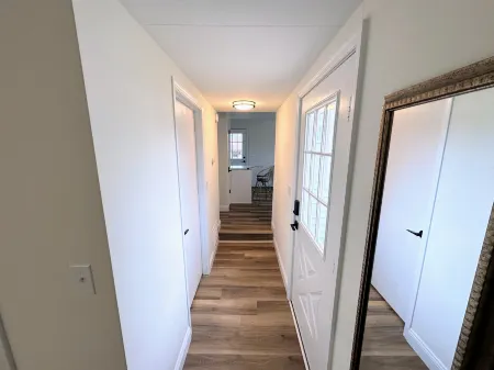 Cozy Living Area and Modern Kitchen Amenities - Charming Retreat