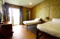 Atap Homestay Hoteles en Bukit Baru
