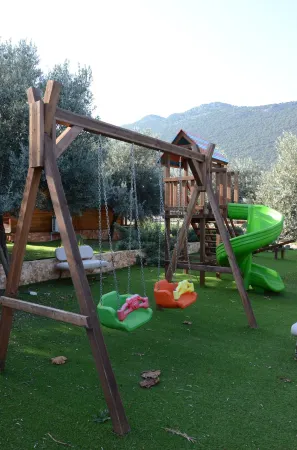 Doganin Ruhu Hotel & Bungalow Отели в г. Каш