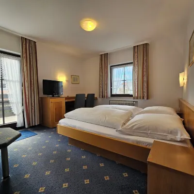 Arrivel Hotel am Bergson Отели рядом с достопримечательностью «Железнодорожный вокзал Мюнхен-Фрайхам»
