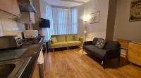 Waterworks En Suite Rooms with Private Living Room