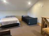 The Pedaler's Rest Retreat - Lakeside Tiny Home for 8 guests Hotels in Rock County