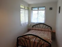 Charming T2 '' Le Colibri '' garden floor with flowers and all comforts in Ste Anne Wifi Hotels near St. Anne Beach