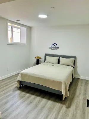 Delightful 2-bedroom New built with spa-like washroom and dedicated laundry. Hotels near Walmart Supercentre