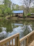 Historic Cabin in a natural setting with waterfalls and covered bridge