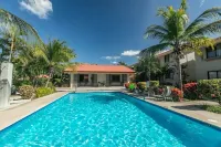 Poolside in Paradise: Walk to the Beach and More!
