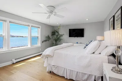 Enjoy Gorgeous Sunsets from Your Waterfront Beach Cottage Hotels near Bumpkin Island