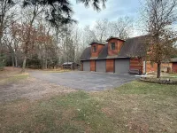 Escape to a Beautiful 4-Bedroom 2-Bath Waterfront Log Home in Danbury, Wisconsin