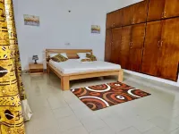 Villa Charmante Avec 3 Chambres et Salles de Bains Privées au Centre D'abidjan ! Hotel a 