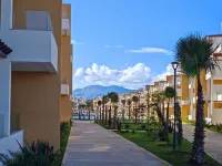 Light & Airy Family apartment with private pools & excellent local beaches