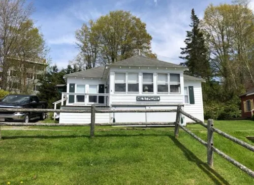 Charming cottage on Lake Willoughby w/ sun porch, private deck and dock.