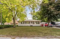 Welcoming 2-bedroom home with large deck and central location.