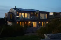 Stunning architect designed eco beachfront property