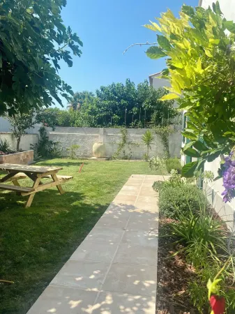 Magnificent village house with lush garden 5 minutes walk from the beach