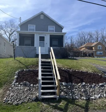 This Quaint home overlooking Cayuga Lake is the perfect Finger Lakes Getaway!