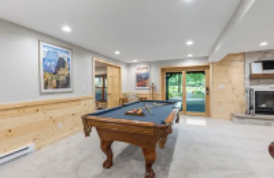 Whitefish Chain Lake Home with Beach + Sauna + King Beds + Kayaks +Paddle Boards