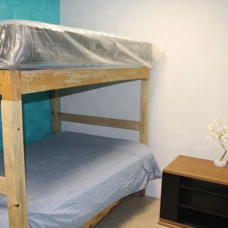 Aquí Comes Rico Airport Hostel Share Room