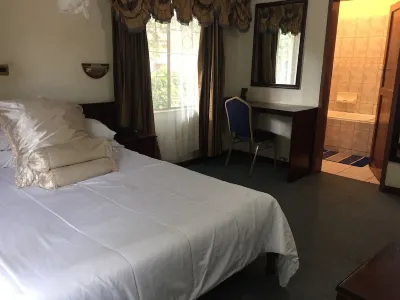 Roysam Lodge Hotel a 