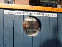 PORTHOLE:  Peaceful with a private, locked, covered patio to relax/ store bikes.