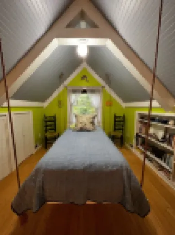 The Blue Cottage located in the woods on Lookout Mountain in Rising Fawn GA