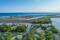 Oak Island home on the Davis Canal with private boat dock.