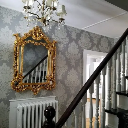 Enjoy comfortable elegance in this secluded grand home located in town