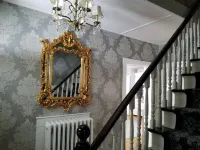 Enjoy comfortable elegance in this secluded grand home located in town