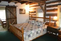 Restored Historical Farmhouse With Pond And Farm Animals At Mohican State Park