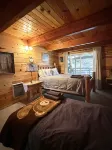 Cozy up in Our Cabin. We Have Starlink and a Wood Stove!