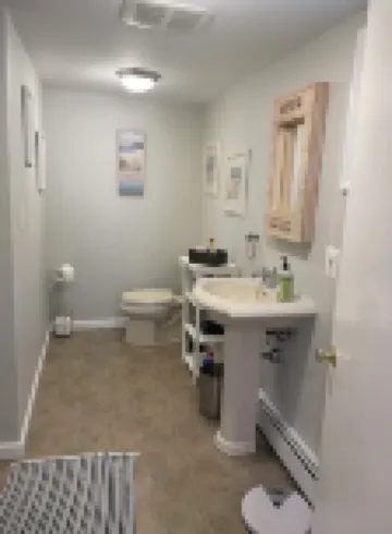 Beachfront Bliss: Water Front, Steps to Sand, Minutes from Dining & Attractions!