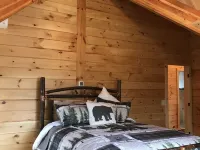 Luxury Log home steps from private beach in Meredith on Lake Winnipesaukee. Hotels in Meredith