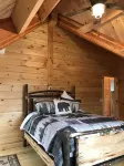 Luxury Log home steps from private beach in Meredith on Lake Winnipesaukee.