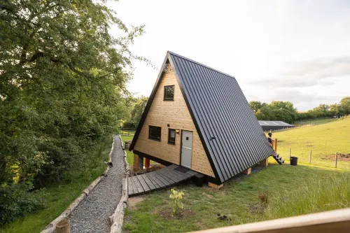 Stunning Scandinavian A Frame lodge with outside bathtub