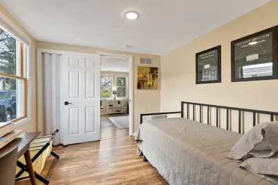 5-Min Walk to MSU — 1GB Fiber, EV Garage & Patio Hotels near Wharton Center