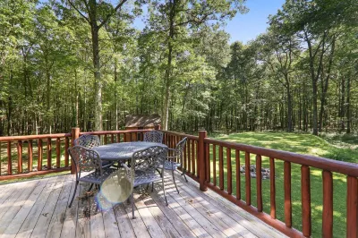 Walk to the Pocono Raceway From a Custom Log Cabin