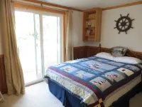 Soundfront Sunsets with Private Dock, Kayaks, Large Pool, Hot Tub, Guesthouse