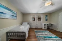 One Story House, King Beds, TV in all bedrooms, Desks, Grill and Pool.