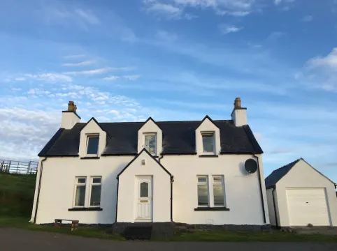 Traditional Croft House, modern interior, in stunning landscape, near the coast.