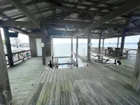 Slice of Heaven 3/2 camp on lakefront w/ boathouse