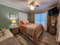 Beautiful Beach Home- 3 min walk to beach-Boat dock in back yard & private pool