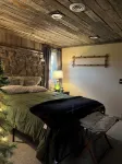 Cozy up in this rustic Stone Lodge and relax by the fireplace