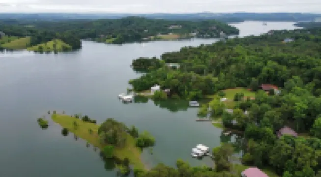 BRAND NEW Lake Front home. Private cove and boat dock! Modern farmhouse appeal!
