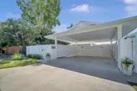 Tropical Private Oasis with heated pool just a short walk away from 4 mile beach