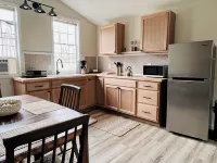 Cozy cabin retreat in rustic setting. Private lake, bonfire under the stars!