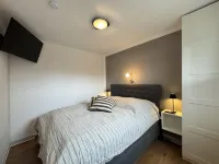 Near the beach, modern ground floor apartment with balcony, free Wi-Fi Hotel a Horumersiel