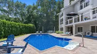Modern coastal retreat w/ pool,  close to beaches and golf courses.