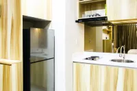 Modern Style the Oasis Studio Apartment with Comfortable Sofa Hotels in South Cikarang