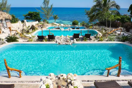 Hermosa Cove Villa Resort & Suites Отели рядом с достопримечательностью «Тертл Ривер Фолс & Гарденс»