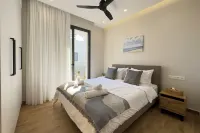 Riviera Escape Suites Hotels near Playground St. Ioannou Voula