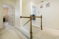 Charming 3-bedroom oasis in lovely Pooler with hot tub, king bed,  and Smart TVs